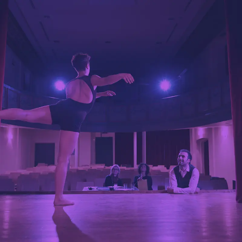 dance audition on stage in front of the director