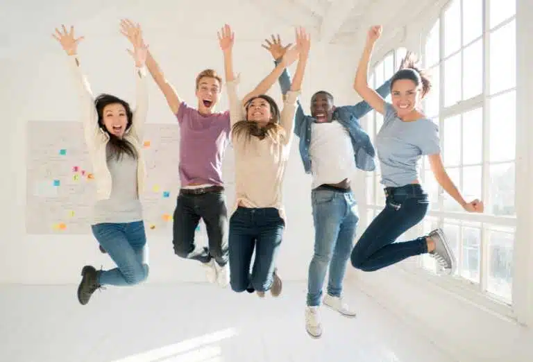 excited people jumping in the air depicting the Los Angeles teacher discount through OTL Seat Fillers