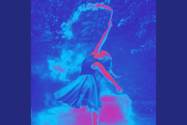 A neon image of a female dancer on stage