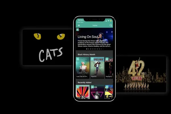 A smartphone screen displays the BroadwayHD app, surrounded by emblems of famous musicals, offering theater lovers a virtual front-row seat to Broadway's finest shows from anywhere in the world.