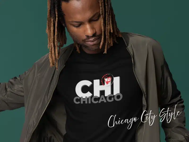 Person wearing a black “CHI Chicago” City Style t-shirt with bold white/gray lettering.