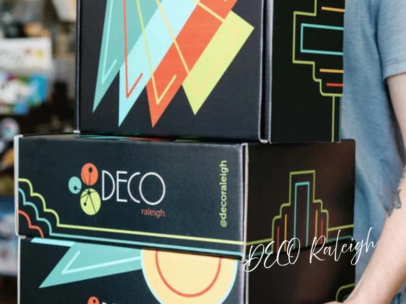 Stacked DECO Raleigh gift boxes with bold geometric artwork, downtown Raleigh gift shop