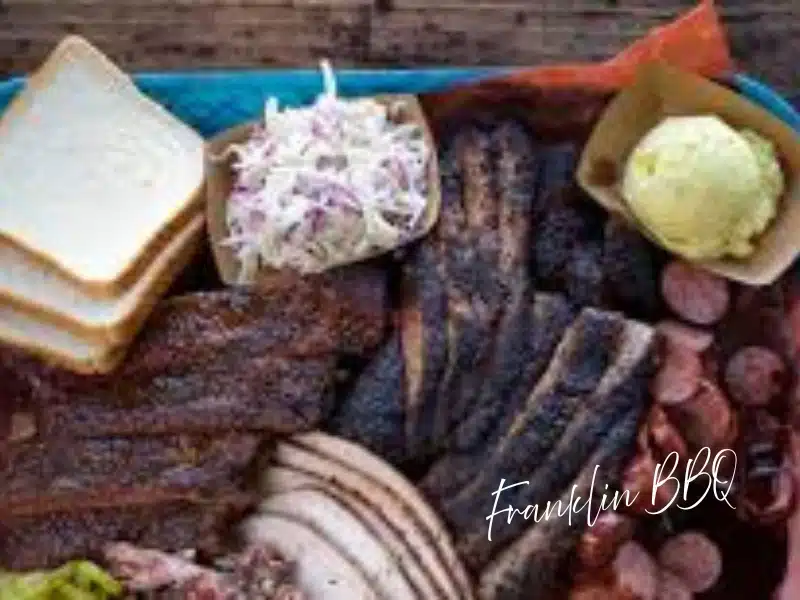 Franklin Barbecue platter—brisket, ribs, sausage and sides—Austin foodie gift idea.