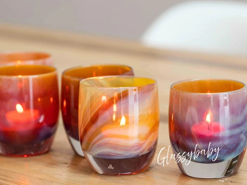 Glassybaby hand-blown glass votive candles in warm sunset colors, Seattle artisan gift