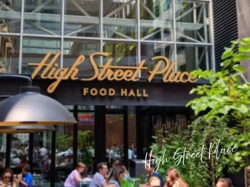 High Street Place Food Hall entrance with outdoor seating—Boston food hall gift card idea.