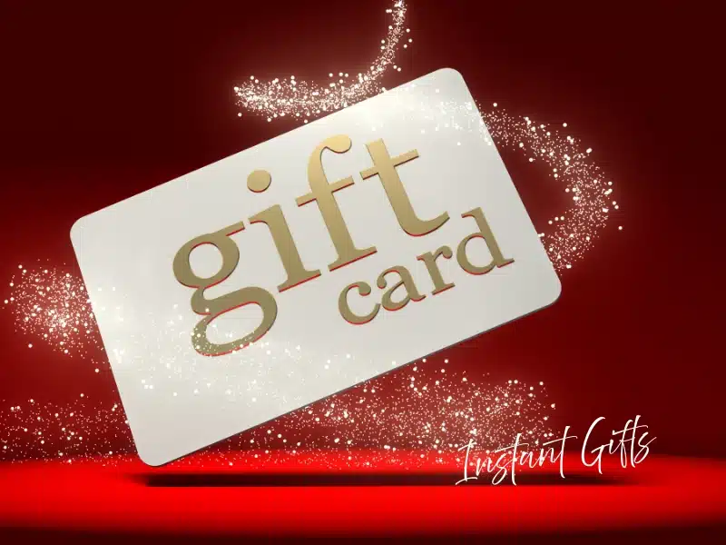 Gift card with sparkles on a red background—instant e-gift for last-minute gifts and experience gift ideas.