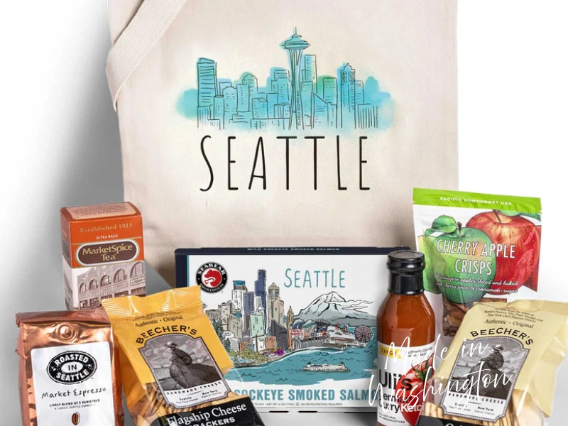 Seattle skyline tote filled with local snacks—smoked salmon, coffee, tea, crackers—from Made in Washington gift box