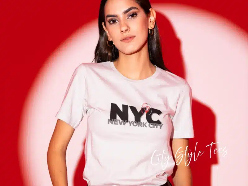 Model wearing white “NYC New York City” City Style tee—New York City gifts & local merch idea.