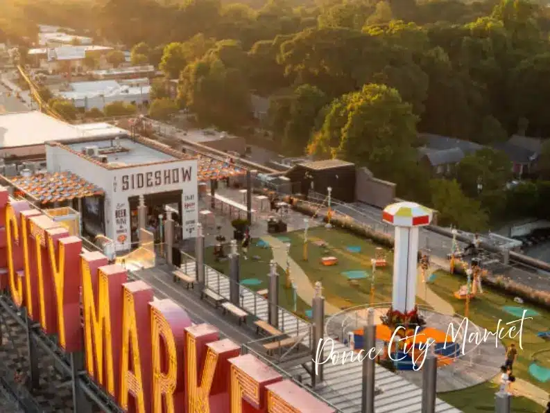 The Roof at Ponce City Market at sunset with Skyline Park mini-golf and rides—Atlanta experience gift idea.