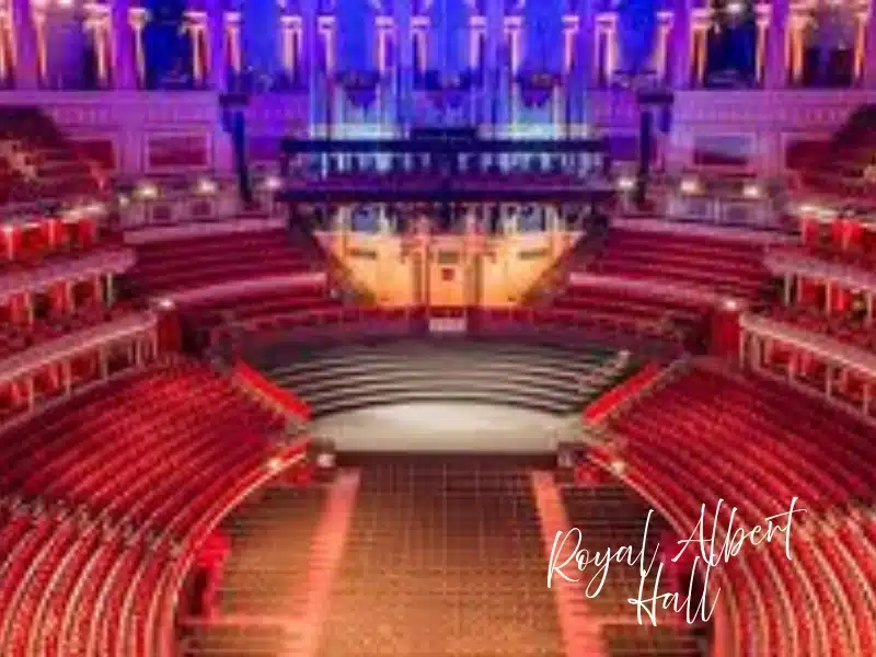 Royal Albert Hall auditorium glowing red and purple—London experience gift idea (concert tickets or gift vouchers).