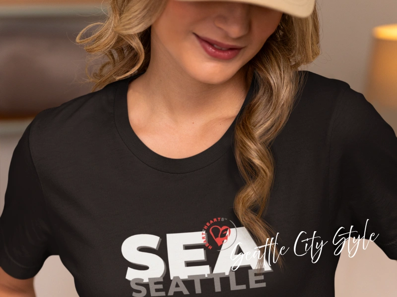 Close-up of Seattle City Style SEA tee on a model, local merch gift idea