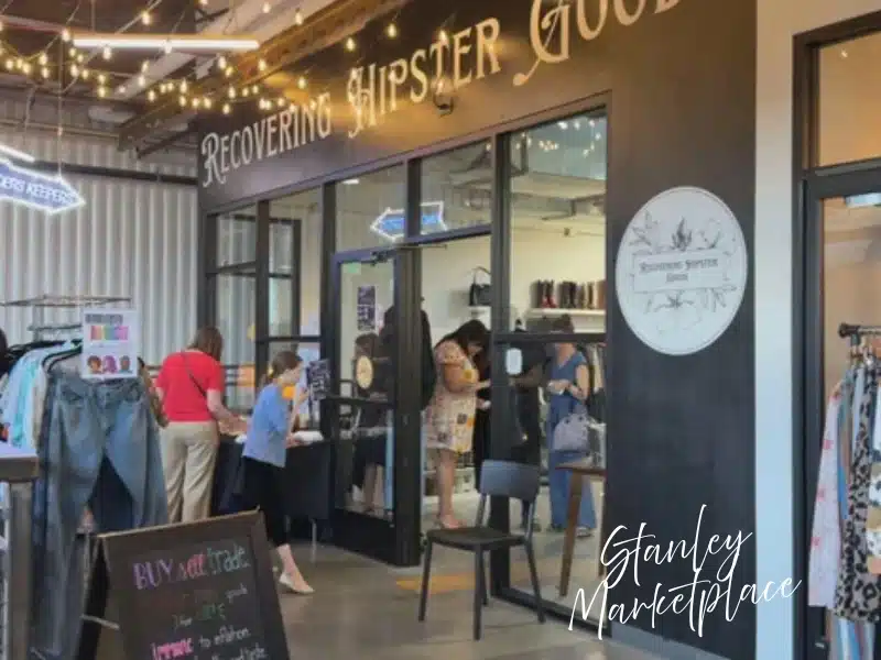 Stanley Marketplace shop with string lights and shoppers—Denver gift idea for a Stanley Marketplace gift card.