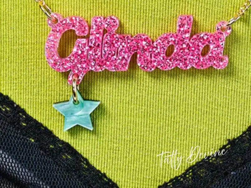 Tatty Devine glitter name necklace with star charm—London jewellery gift idea.