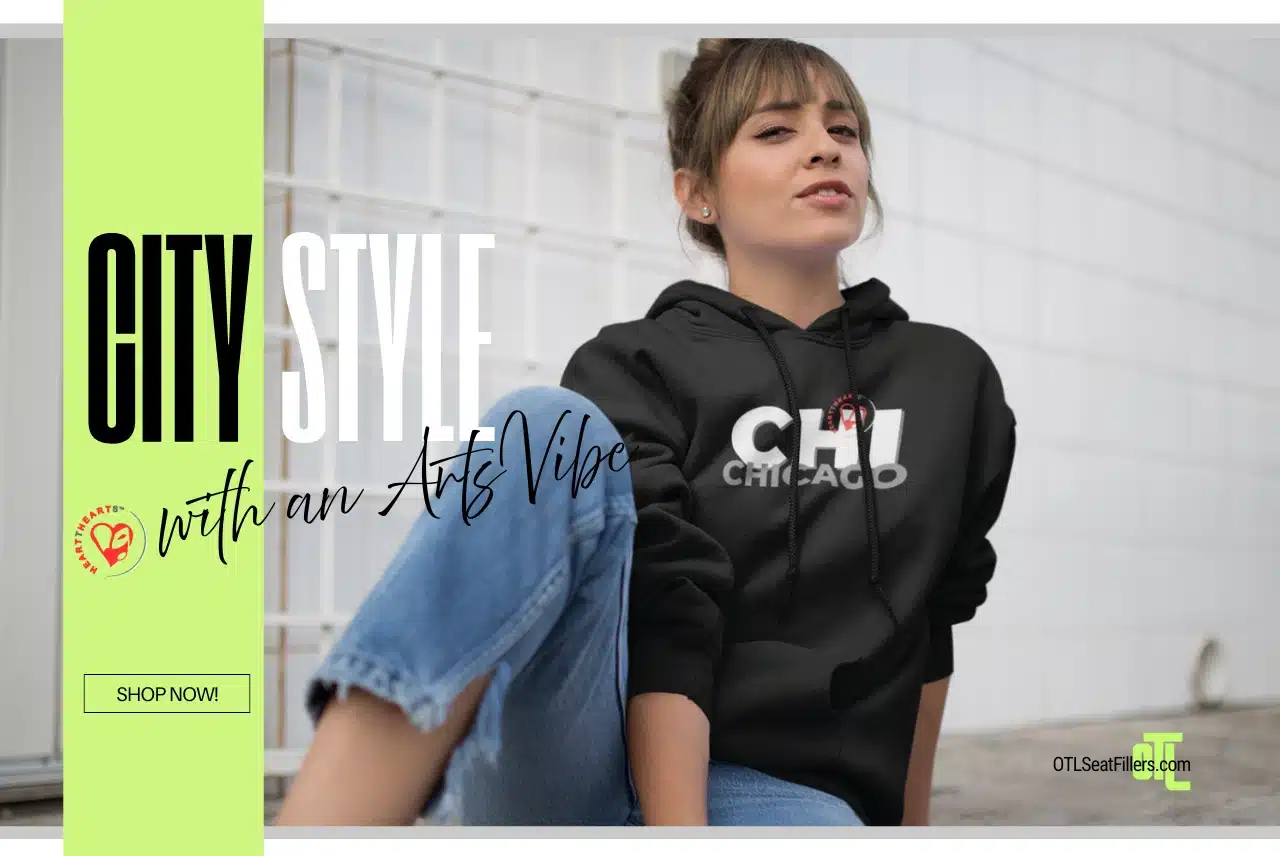Woman wearing a black Chicago City Style hoodie from OTL Seat Fillers sitting casually against a tiled wall.