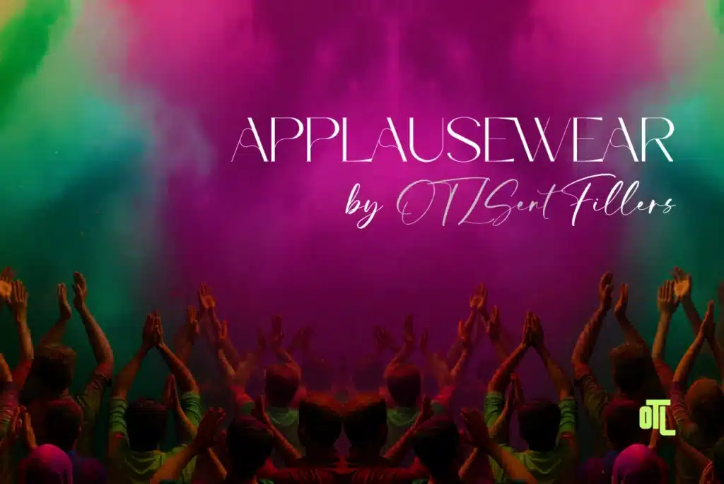 Applausewear by OTL Seat Fillers banner with cheering audience and colorful theatre-style stage lighting