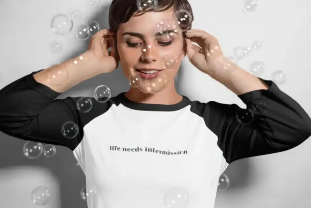 Black and white Life Needs Intermission baseball shirt.