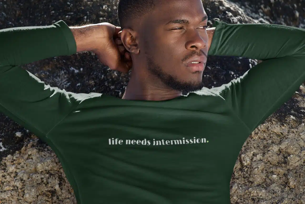 Life Needs Intermission dark long sleeve t-shirt with white text on the front.