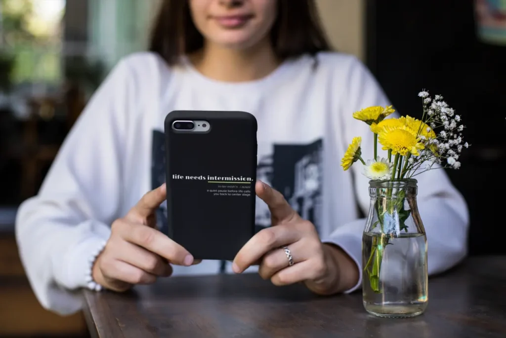 Life Needs Intermission Busy Life Edition black phone case with definition-style text.