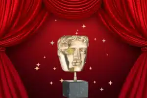Gold BAFTA-style mask award on a red theatre curtain background with sparkling star accents.