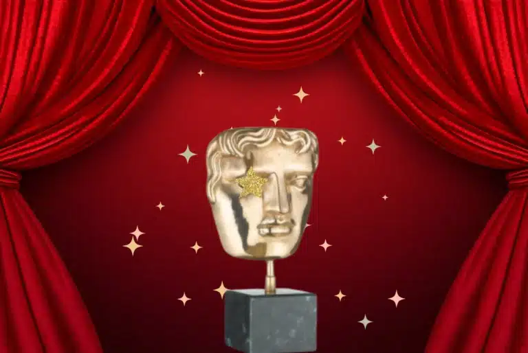 Gold BAFTA-style mask award on a red theatre curtain background with sparkling star accents.
