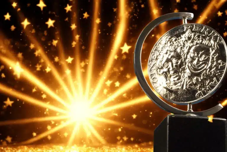 TONY-style theatre award trophy with comedy and tragedy masks against a glowing golden starburst background.
